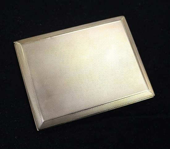 A 9ct gold engine-turned cigarette case (inscribed)
